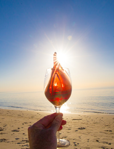Wine splash at Port Willunga Beach in the Fleurieu Peninsula, near Adelaide in South Australia